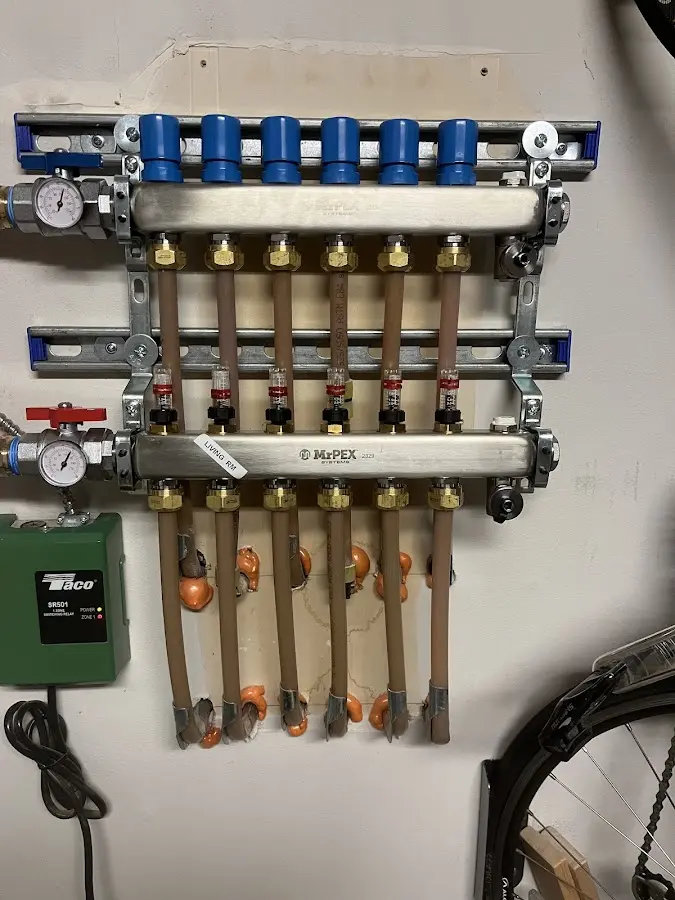 Plumber performing Gas Line Installation at a residential property in Grinnell